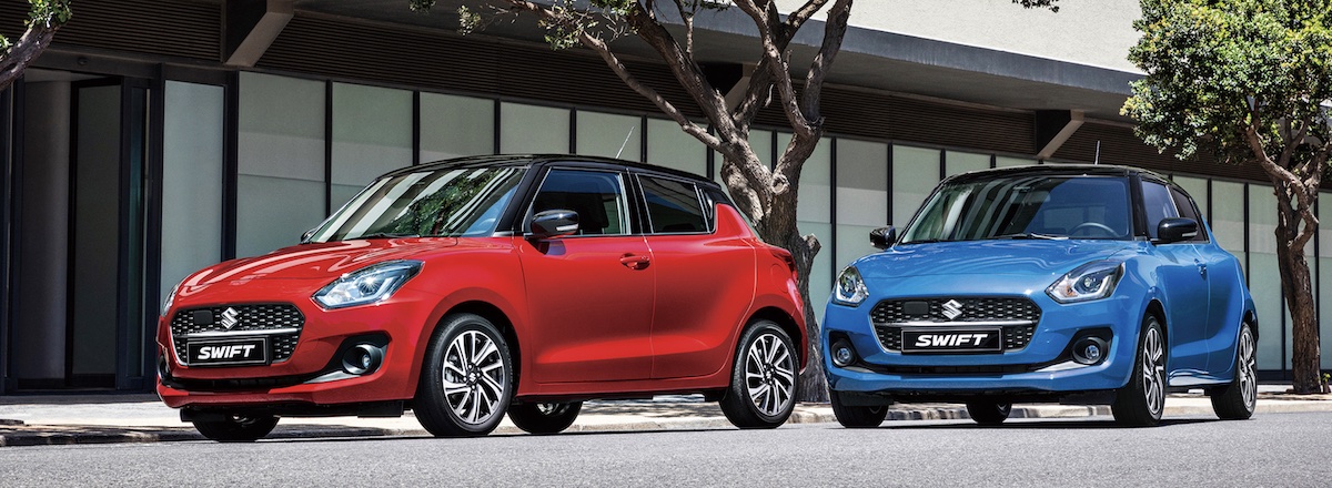 red and blue 2023 Suzuki Swift models